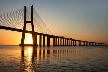 Sunrise Over Vasco da Gama Bridge Spanning the Tagus River in Lisbon, Portugal