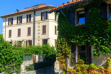 Obraz premium Old houses near the basilica of San Vincenzo in Galliano at Cantu, Como province, Italy
