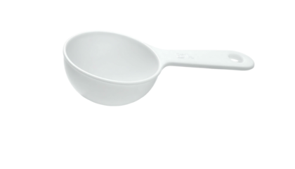 A white plastic measuring scoop with a slightly curved bowl and a handle featuring a thumb hole, isolated on a black background