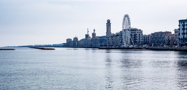 Panorama of Bari, Puglia or Apulia, southern Italy with Mediterranean Sea, Ferris wheel and fascist architecture on the seafront promenade