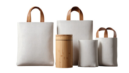 Three white canvas tote bags of varying sizes,  with light brown handles, and a small bamboo cylinder container