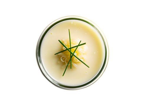 Creamy Soup with Garnish of Chives and Decorative Swirl Design