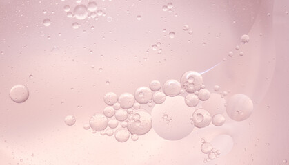 Abstract Pink water bubbles oil background
