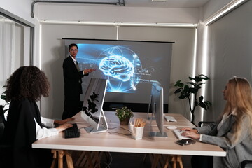 IT developer group meeting, managers present software development on PC monitors, consult and research, and create a business plan, investment strategies using artificial intelligence.