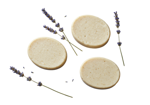 Three oval artisanal lavender soap bars with natural textures and dried sprigs in a diagonal row on a seamless transparent background, 45-degree high-angle studio shot, bright diffused light. Concept