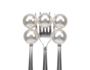 Pearls balanced on a fork