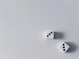Two dice showing double three in the bottom right corner with copy space