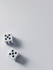 dice cubes with double five in the corner, vertical layout, space for text