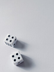 dice cubes with double four in the corner, vertical layout, space for text