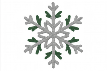 Glittering silver and green snowflake decorating for festive winter holidays and christmas themes