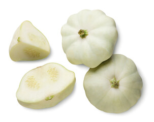Two pumpkin pattypan squash, half and a piece on a white background. Top view