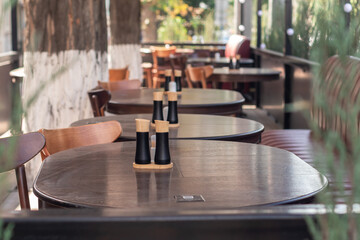 Summer terrace of a street cafe without people.