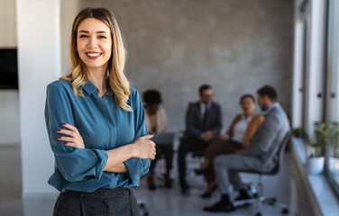 Successful executive standing proudly in office, representing business growth, partnership