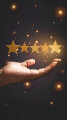 Hand holding glowing gold stars, signifying high ratings