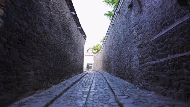 Historic Hisar Kapia Gate in Plovdiv&rsquo;s Old Town, a medieval architectural landmark dating back to the 11th&ndash;13th century, revealed in a cinematic push in shot.
