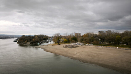 landscape by the Danube river in Novi Sad in autumn, with stormy clouds