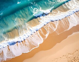 Aerial view of turquoise waves crashing on a sandy beach