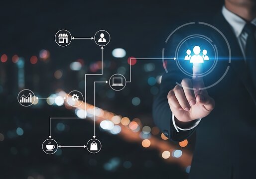 Businessman touching a digital network of icons representing business and technology