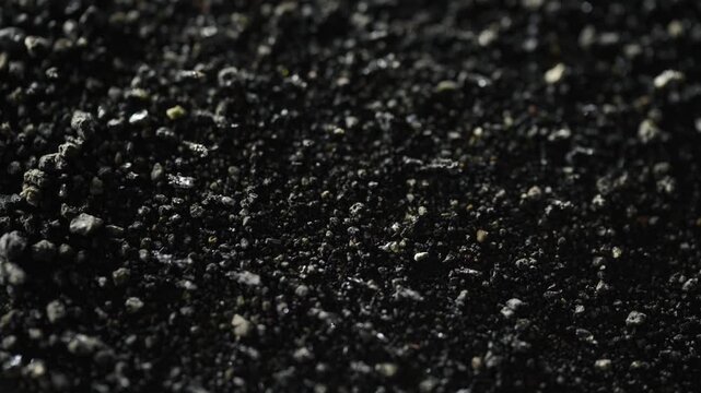 Macro Closeup Of Rocky Particles Moving In Magnetic Field