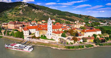 Austria tourism. Wachau valley scenery Danube river boat cruise. scenic village Durnstein ,aerial panoramic view of colorful town and ruined castle