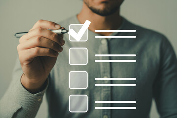 Checklist completion concept man checking tasks with pen business survey form to do list planning  process