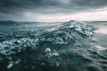 Close-up of ocean waves crashing,  dark grey water,  dramatic sky,  bubbles,  splashing