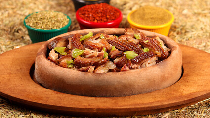 delicious kokorech served with vegetables and spices,big close up