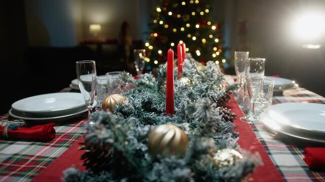 Set Christmas table for family dinner 