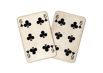A pair of  identical vintage playing cards isolated on a white background.