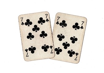 A pair of  identical vintage playing cards isolated on a white background.