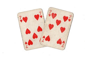 A pair of  identical vintage playing cards isolated on a white background.