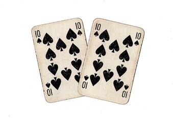 A pair of  identical vintage playing cards isolated on a white background.