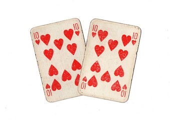 A pair of  identical vintage playing cards isolated on a white background.