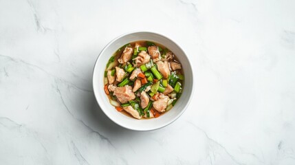 A beautifully arranged bowl of chicken and vegetables showcases a nutritious meal, highlighting the vibrant colors of fresh ingredients harmoniously combined for a tasty dish.