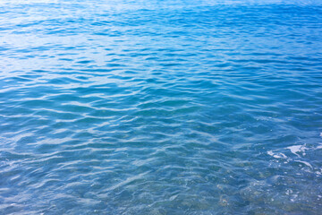 Fototapeta premium Clean wavy water on beach as background