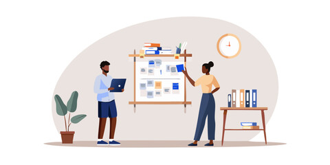 Diverse team collaborating on a project using a whiteboard and laptop in a modern office setting