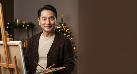 Young barista smiling while pouring milk into red coffee cup in cafe