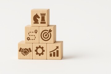 Wooden Blocks with Business Symbols in an Organized Stack on a Light Background