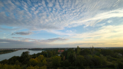 landscape by the Danube river in Novi Sad in autumn, with beautiful small white clouds