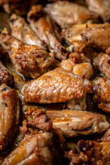 Crispy baked chicken wings close-up