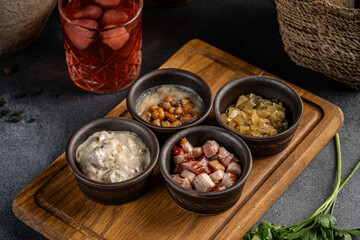 Assorted appetizers in rustic bowls