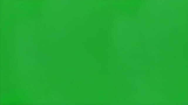 Thick smoke cloud on green screen for visual effects processing and chroma key work