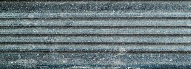 A blue and gray striped surface with a lot of texture