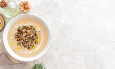 Mushroom cream soup with champignons and thyme. Healthy diet. Vegetarian food.
