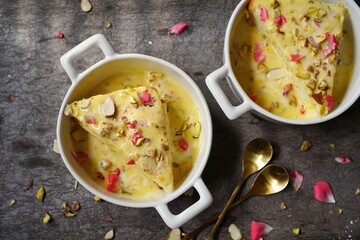 Instant bread Rasmalai garnished with nuts and rose petals - Diwali Holi desserts