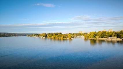 Fototapeta premium landscape by the Danube river in Novi Sad in autumn, with clouds reflected in the water