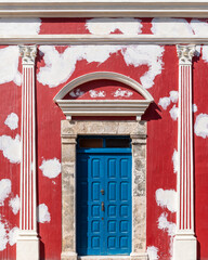 Colonial style facade architecture in restauration, Campeche city, Mexico.
