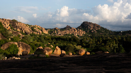 A dramatic view of Hampi's golden boulders just before the sunset.