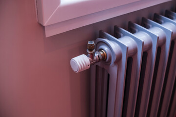 Radiator valve close up home heating system temperature control comfort energy efficiency maintenance tips