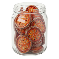 Glass jar of dried bael fruit slices with sugar crystals isolated on white background
